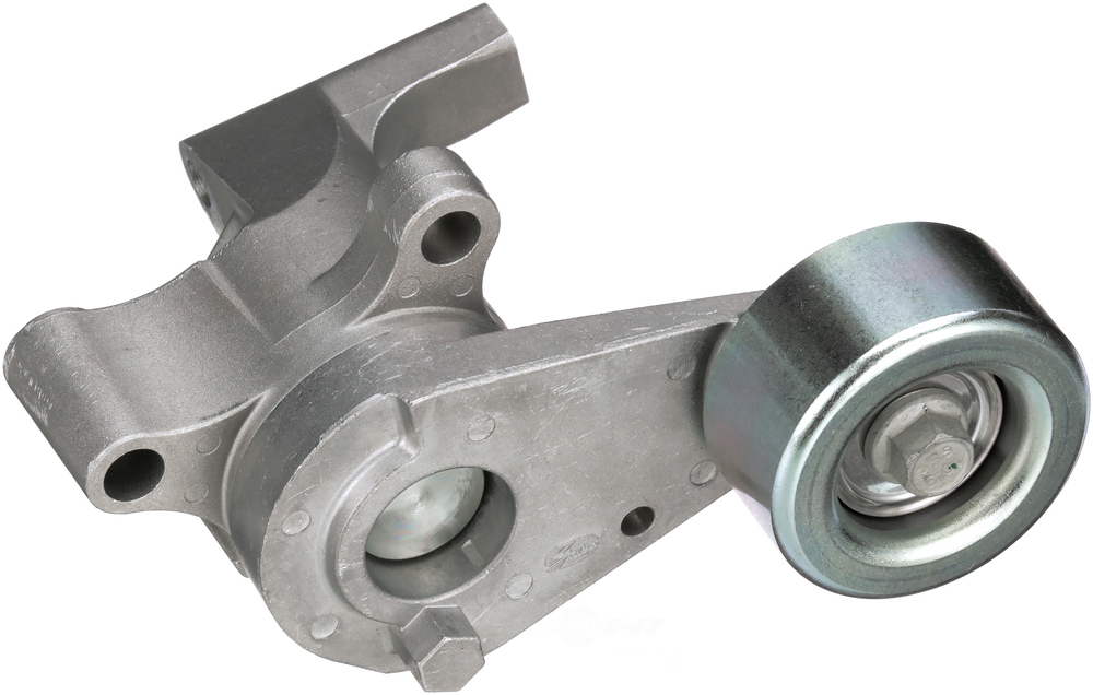 Drive belt outlet tensioner assembly